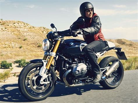 Suzuki motorcycle mechanic training and courses mmi. Person riding a 2019 BMW R nineT motorcycle on a desert road