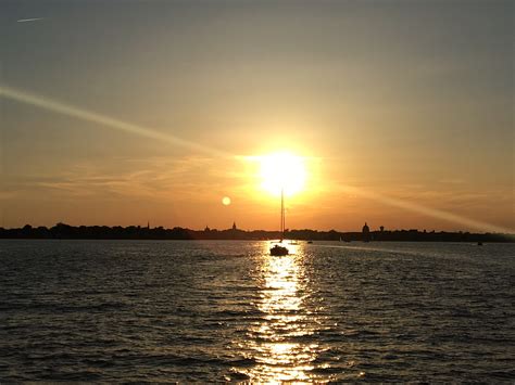Sailboat At Sunset Schooner Woodwind