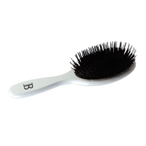 Working to strengthen, rebuild and repair hair from the inside, this unique, replenishing system promises nourished, lustrous locks. Balmain Hair Extension Brush | Adel Professional