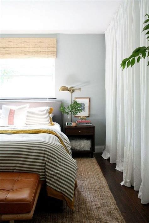 Some people don't want to use a large rug under the bed, but still want a soft place to land when getting out of bed. Layering Rugs Under Beds | Centsational Style