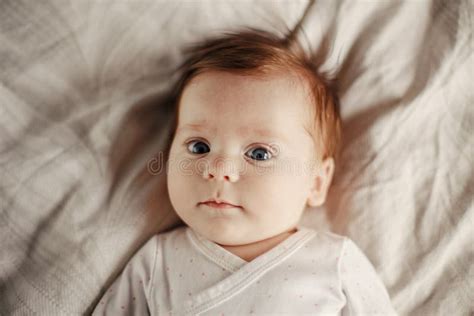 Closeup Portrait Of Cute Caucasian Newborn Baby Adorable Funny Child