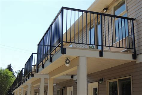 The square bases on the fascia posts are very minimal and will mount to a very small area. Picket Railing | Square Top | Fascia Mount | Sundeck Centre