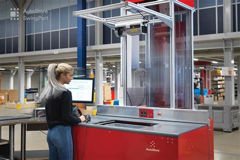Products are stored in stacked bins within the dense aluminum grid. AutoStore - Introducing AutoStore SwingPort™ We have ...