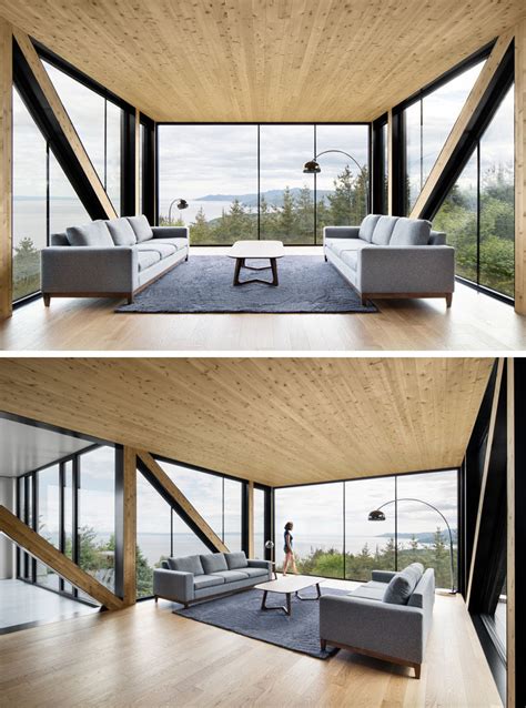 Floor to ceiling windows do not have to be plain and square. The Living Room In This Home Is Inside A Box That Hangs ...
