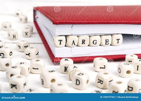Word Target Written In Wooden Blocks In Notebook On White Wooden Stock Image Image Of Computer