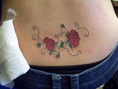 25 Cute Lower Back Flower Tattoos For Girls