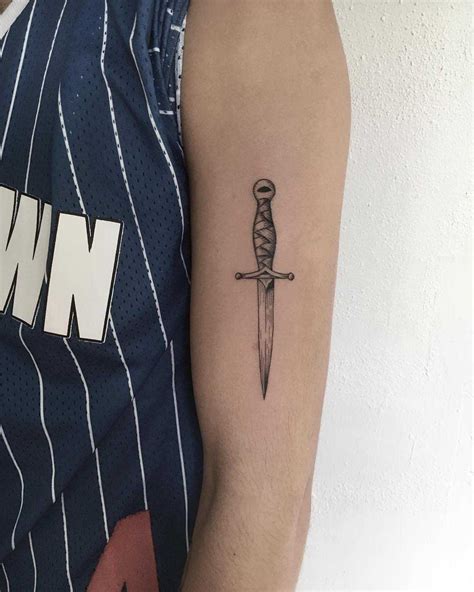 75 incredible dagger tattoos inspirational tattoo ideas and meanings 2022