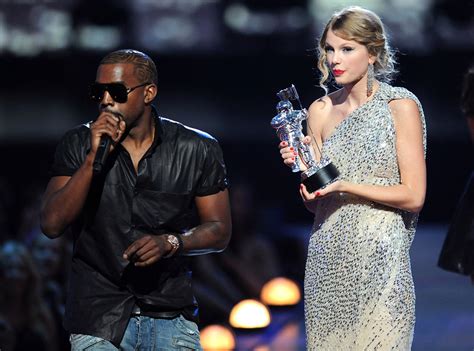 photos from a history of kanye west s feuds from george w bush to taylor swift e online