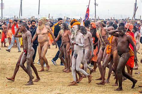 Naked Hindu Devotees Walking To The Bank Of The Ganges River Kumbh