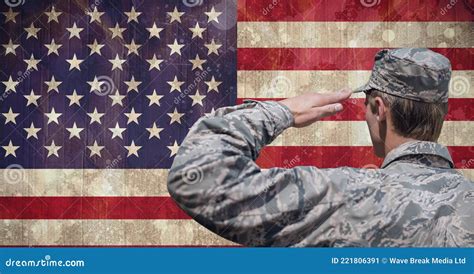 Composition Of Male Soldier Saluting Over American Flag Stock Image