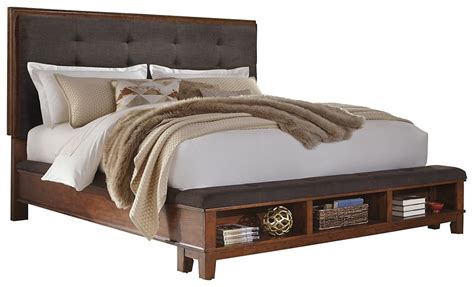 Soft faux leather covers the caldwell upholstered bed which features a tufted headboard and wood supports. Ralene - Queen Upholstered Panel Bed | B594B2-54-57-96 ...