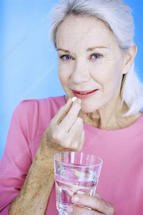 Elderly Person Taking Medication Stock Image C0218876 Science