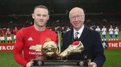Wayne Rooney Handed Trophy By Sir Bobby Charlton After Becoming