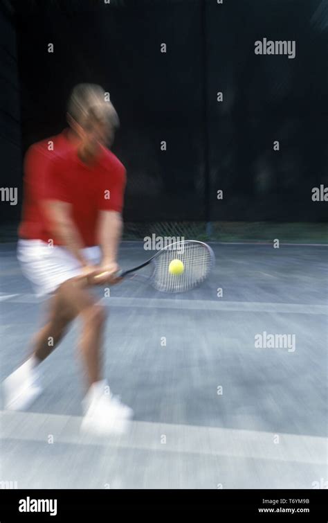 Male Tennis Player Hitting Ball Zoom Effect Stock Photo Alamy