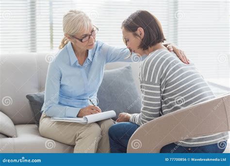 Therapist Comforting Upset Woman On Sofa Stock Image Cartoondealer