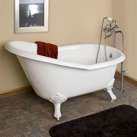 This bathroom features a large skylight window, allowing for fresh air and natural sunlight to flood into the room. Clawfoot Jacuzzi Tub - Bathtub Designs