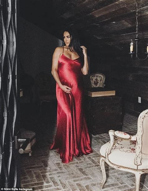 Nikki Bella Stuns In Skin Tight Red Gown As She Prepares To Give Birth