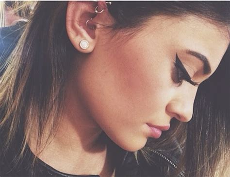 15 Pretty Ear Piercings Thatll Inspire You To Add More Studs Stat