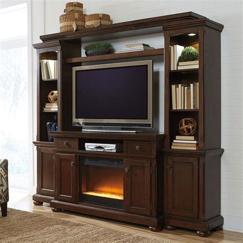 This electric fireplace entertainment center has got you covered, plus the unit can heat an entire room, up to 625 square feet. Porter Large Entertainment Wall w/ Glass and Stone ...