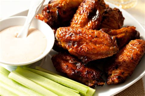 These wings are coated with a rub, cooked over indirect heat with the apple wood chunks for about 40 minutes, then finished with a sweet and spicy there's a lot going on here: Sweet and Spicy Baked Chicken Wings Recipe | My Baking ...
