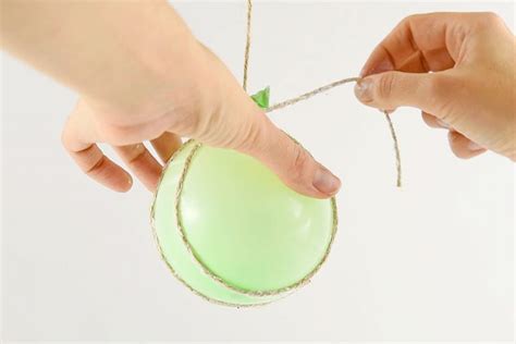 Diy Twine Ball Ornaments Using Balloons Twine And Glue
