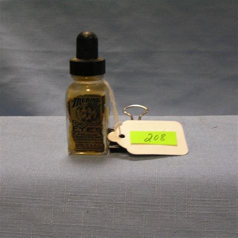 Lot - ANTIQUE MURINE EYE DROP BOTTLE