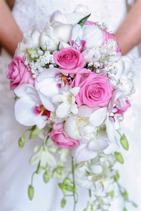 Are you planning an autumn wedding? Teardrop shape wedding bouquet, with phalaenopsis orchids ...