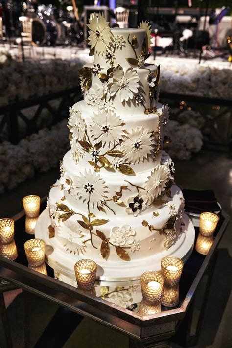 It's contemporary design and clean lines will complement any decor. Tall Cake with White & Gold Floral Accents | Photo ...