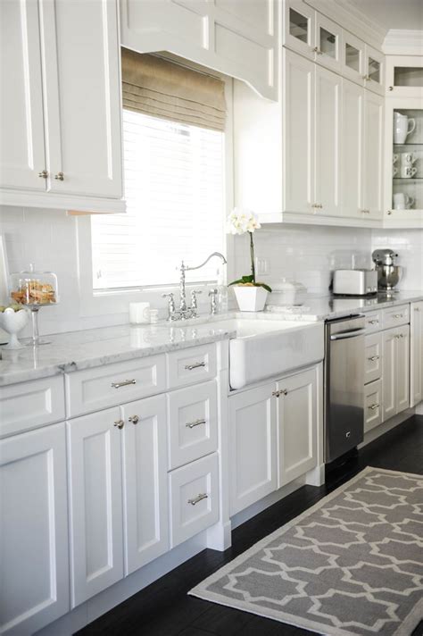 Wooden table on kitchen sink window background. How To Make Your Boring, All-White Kitchen Look Alive ...