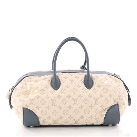 The perforated monogram design in grey adds an elegant contrast against the bois de rose pink shade of the bag. Louis Vuitton Round Speedy Bag Monogram Denim at 1stdibs