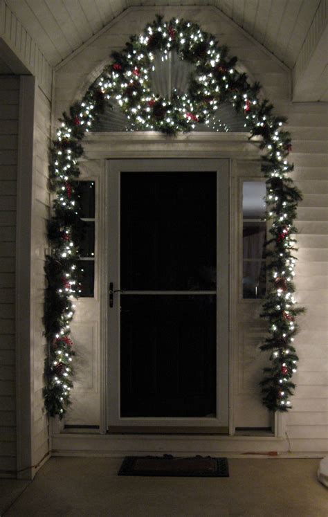 Our Front Door Christmas Decorations Garland And A Wreath With