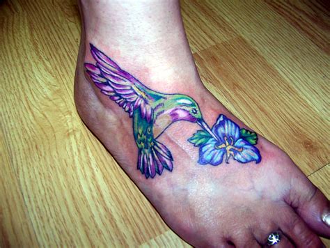 Small Flowers N Hummingbird Tattoo On Foot Tattoo Ideas