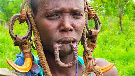 African Tribe With Plates In Their Lips