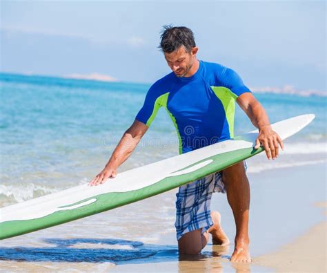 Surf Man Stock Image Image Of Handsome Looking Coast 52045391