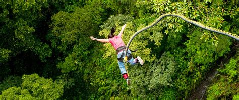 Bungee jumping, sport in which the jumper falls from a high place with a rubber (bungee) cord attached both to his or her feet and to the jump site, and, after a period of headfirst free fall. Bungee/Bungy Jumping Nepal - Trek and Climb Adventure