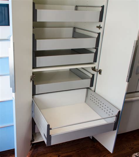 My kitchen was overflowing so for a couple of years i designed major remodels and reviewed this site for inspiration before this idea came. IKEA Akurum high cabinet hack with sliding shelves. Slide ...