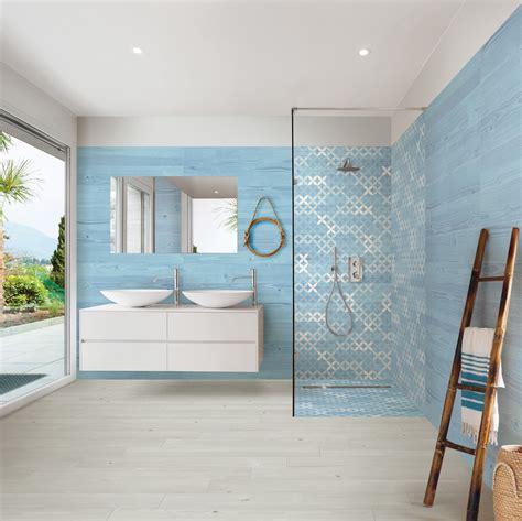 White Colored Bathroom Facets With A Touch Of Smeralda Blu Tiles Are