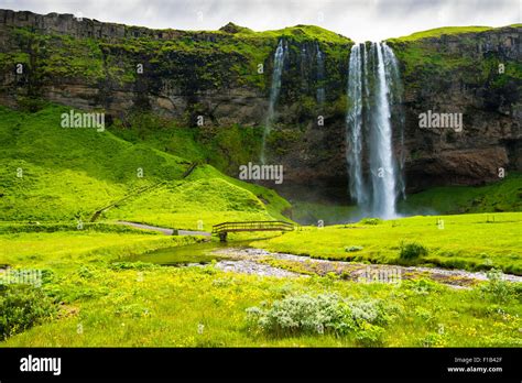 Seljalandsfoss Waterfall With Green Meadows Iceland Stock Photo Alamy