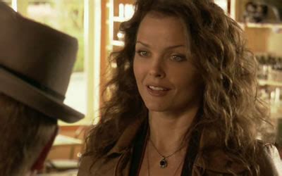 While their affair seems harmless at first, katie. Dina Meyer in The Boy Next Door (2008)