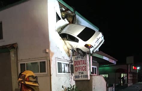 Car Flies Through Air And Gets Stuck Into A Two Storey Building In California Ibtimes India