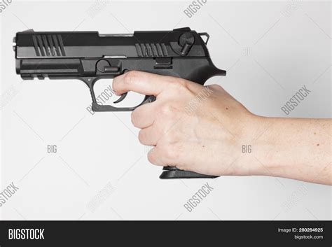 Hand Holding Gun On Image And Photo Free Trial Bigstock