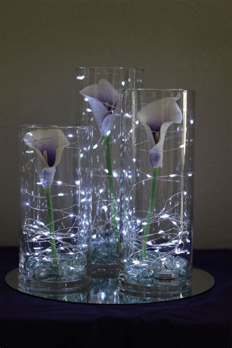Picasso Calla Lilies In Cylinder Vases With Fairy Lights Celebration