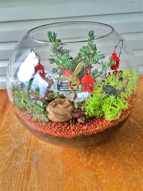 Here's a fun project to do with the kids this spring, with a few simple supplies you can create a growing space for them to enjoy. Miniature Terrarium Fairy Garden - Be A Fun Mum