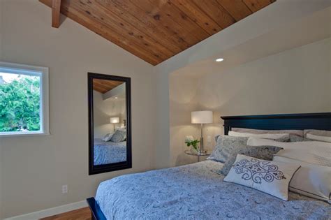 Separate master bathroom for her off the master bedroom. Master Bedroom with wood paneled ceiling - Transitional ...