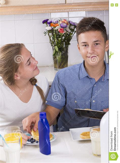brother and sister having breakfast stock image image of positive interior 76855737