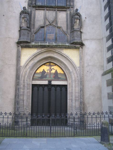 The Doors Of Castle Church In Wittenberg Germany Where Martin Luther
