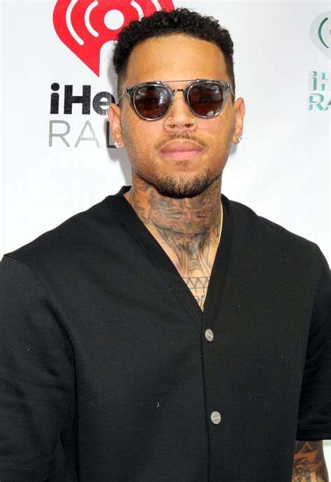 Chris Browns Hairstyles Through The Years Essence