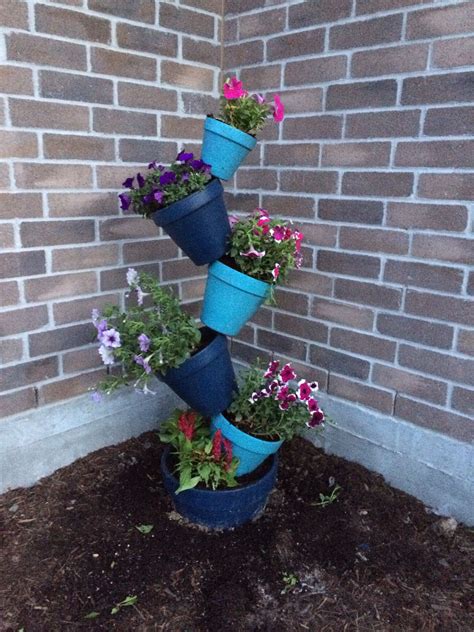 My Flower Pot Tower Looks Great In The Corner Of The Flower Bed And