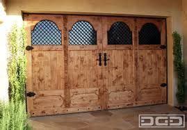 Custom door shop's doors meet all hurricane codes. french country garage doors - Google Search | Garage doors ...