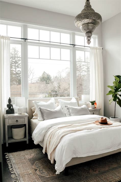 Boy's contemporary nursery with blue damask. White Boho Master Bedroom Makeover - Nesting With Grace